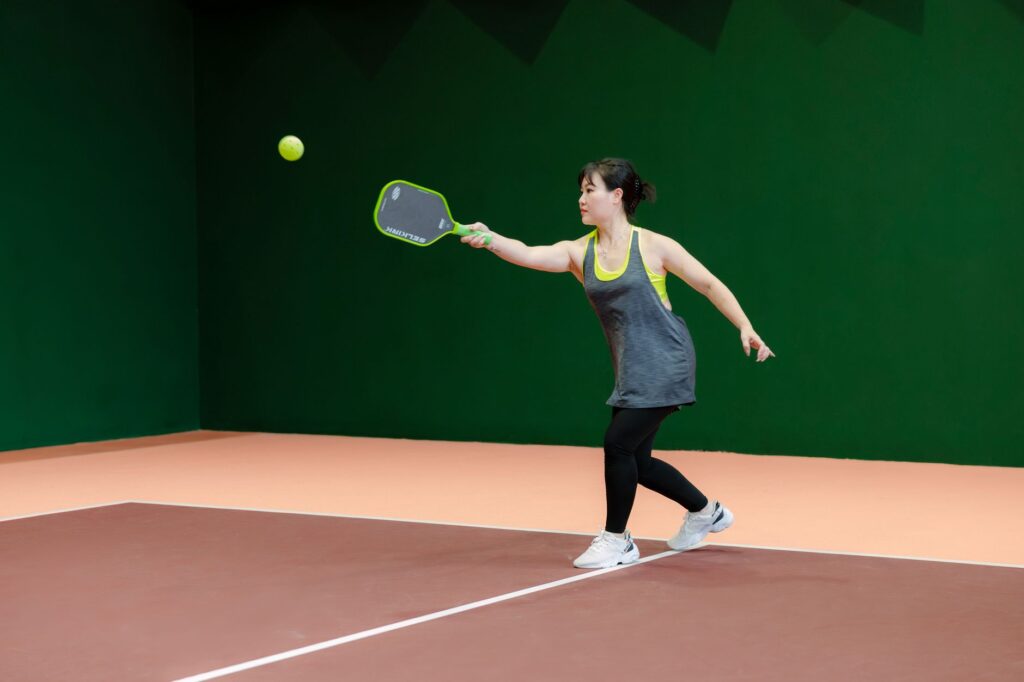 Pickleball in Stamford CT - a player on an indoor pickleball court