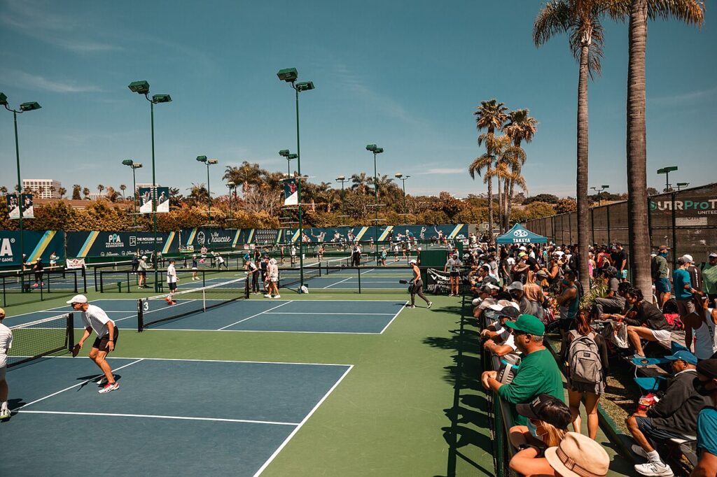 PPA Tour pickleball event courts with spectators watching, the pro tour setting Federico Staksrud competes in