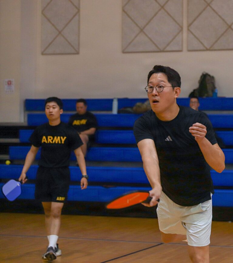 Doubles partners at different depths, showing how far behind the kitchen line each player stands