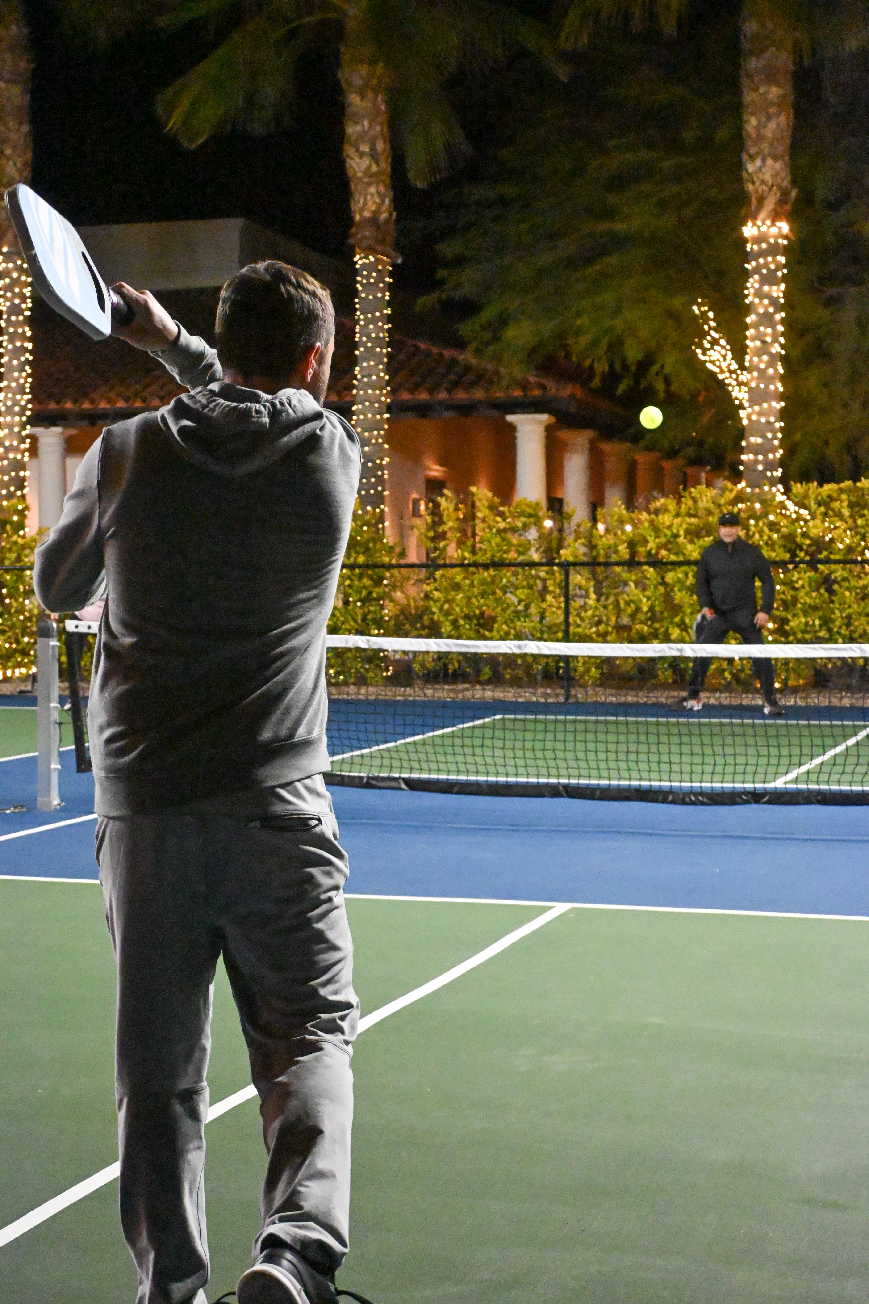 Pickleball players in a doubles rally