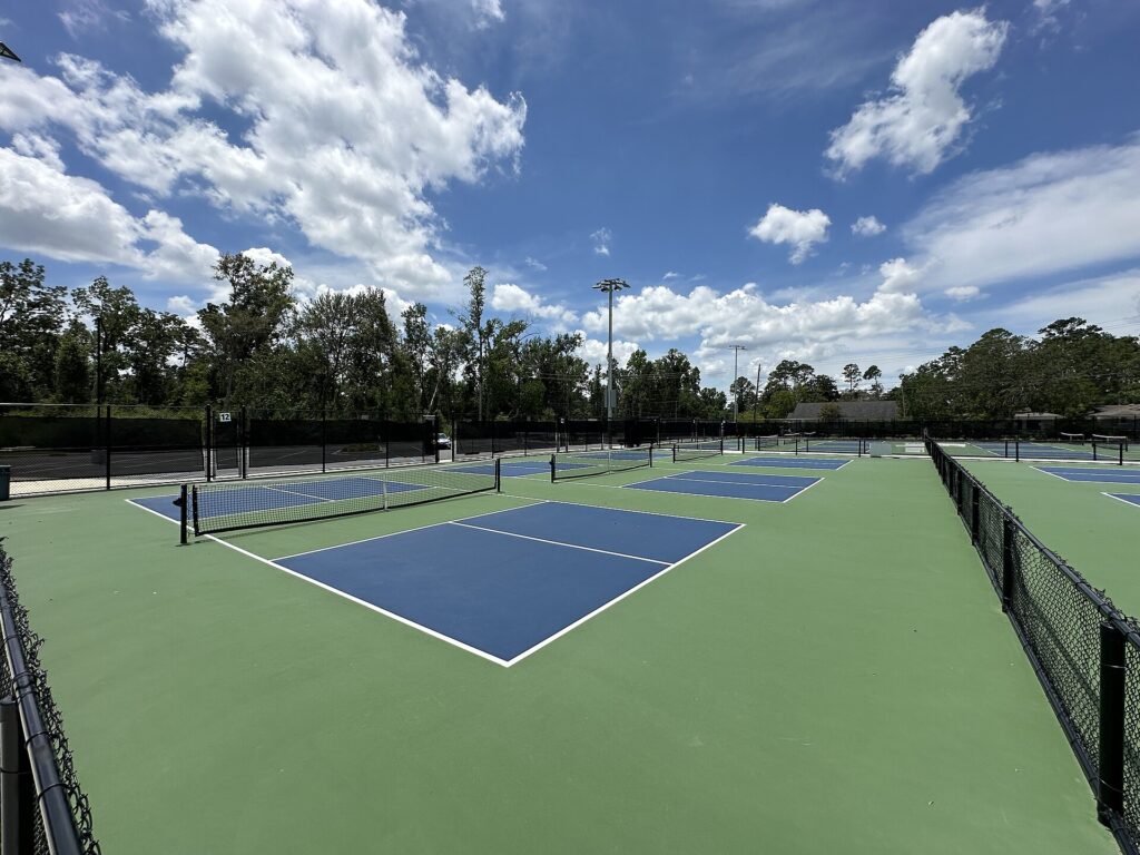 Numbered public courts with permanent nets, the free-court setup players look for when playing pickleball in Narragansett, RI