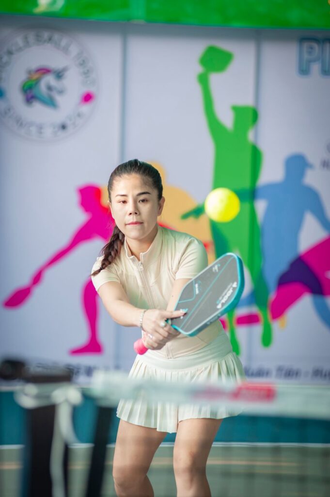 Paddle meeting the ball at contact, the moment that decides whether you can hit the ball twice in pickleball
