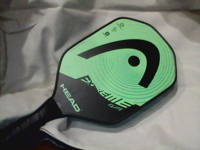 A Head Extreme Elite pickleball paddle, an older graphite design from the era when 13mm pickleball paddles were common