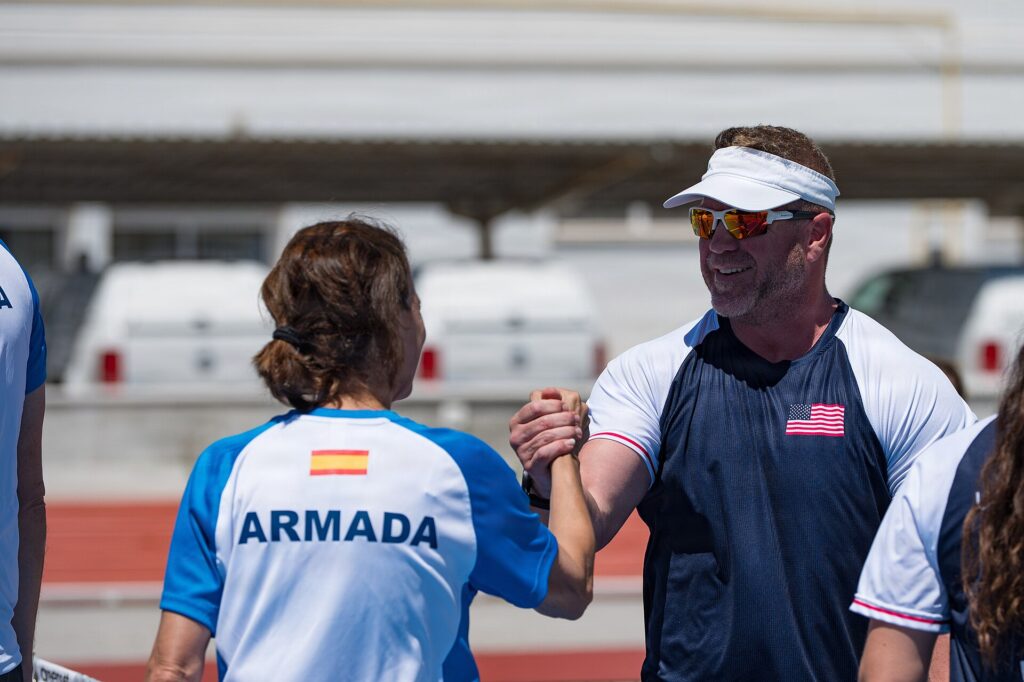 Players shaking hands after a match, like the finalists on Championship Sunday at the Virginia Beach Open